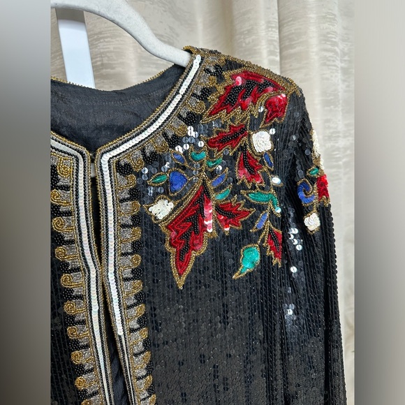 Vintage women’s black silk sequin evening jacket with red floral design. - Picture 11 of 17